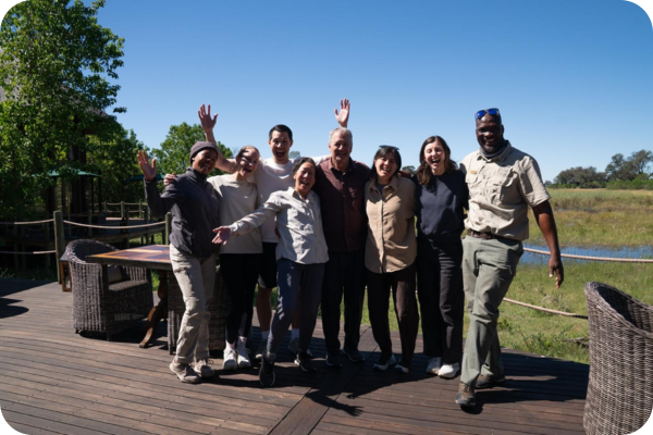 The Chow Family with their guide on a lodge deck in the Okavango Delta